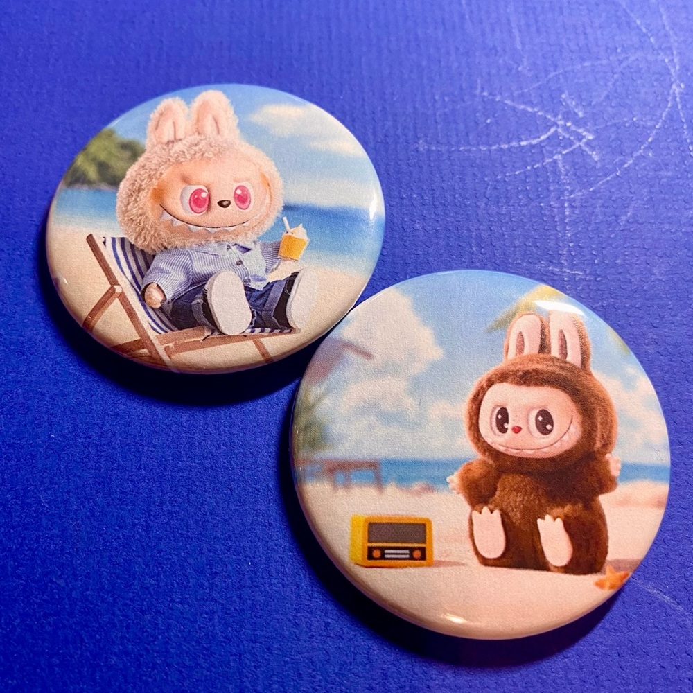Labubu pinback buttons. Set of 2. 2.25” Beach themed.